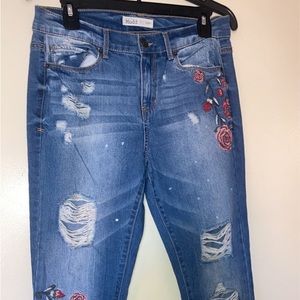 Juniors embroidered jeans.